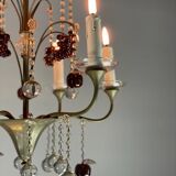 Silver bronze lustre garnished with pampilles, fruits and balls