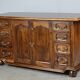 Rustic walnut sideboard with inlaid parquetry, vintage quality.