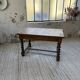 Paneled walnut desk with turned legs, 1900