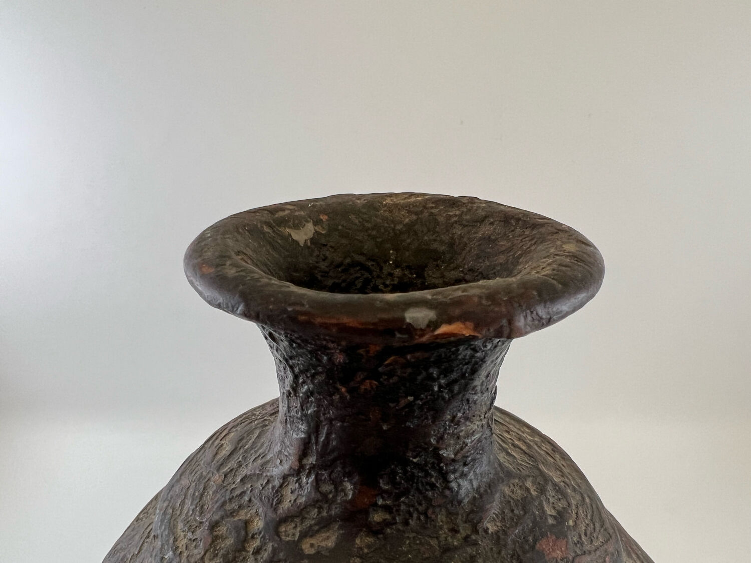 Iridescent black ball vase