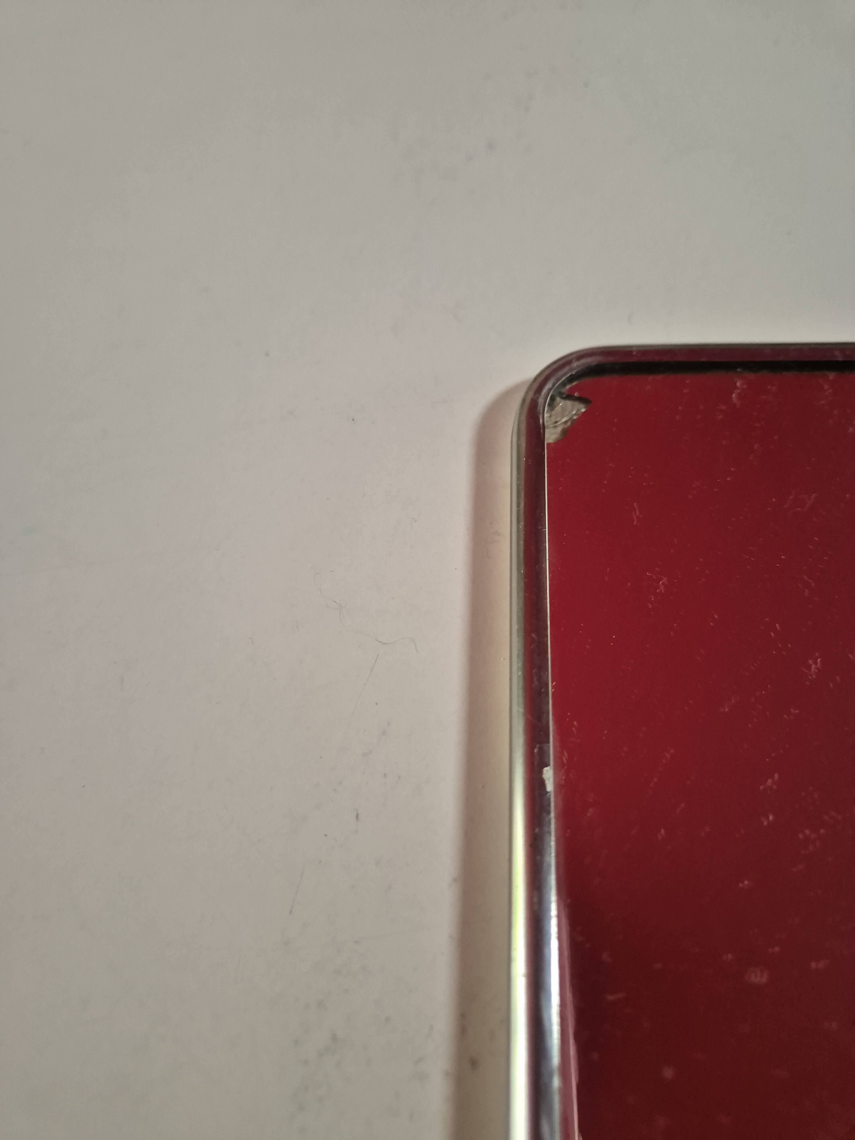 vintage rectangular mirror with broken barber-style chain