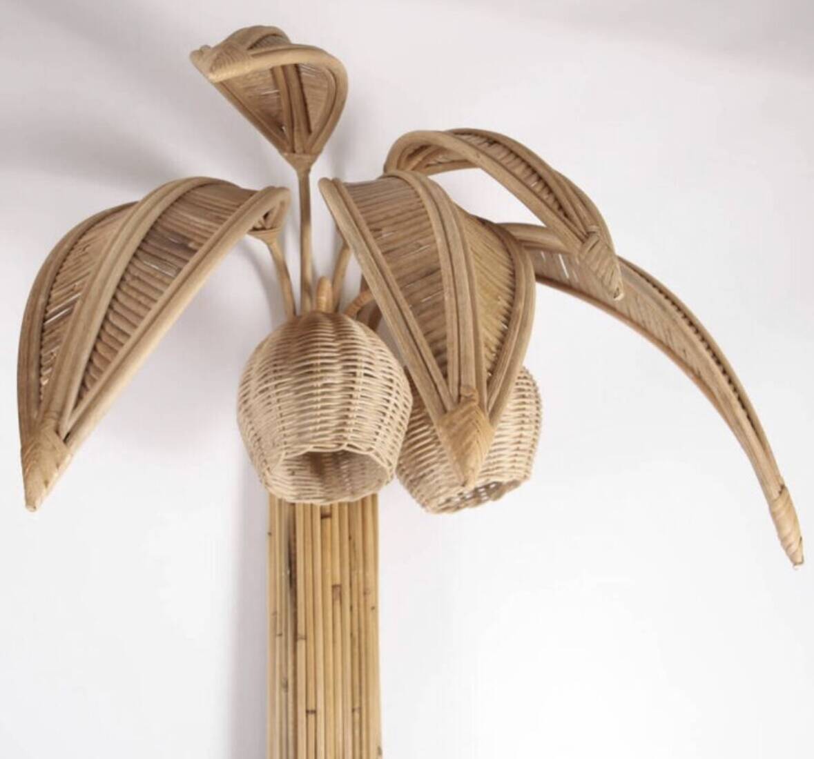 Pair of large "coconut/palm" wall lights in rattan.