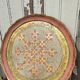 Pink and golden Florentine round top
