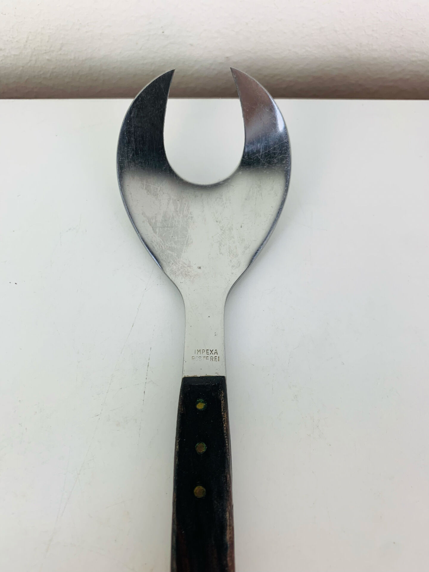 Scandinavian style service cutlery in teak and stainless steel