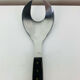 Scandinavian style service cutlery in teak and stainless steel