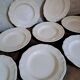 Set of 9 Sarguemines ivory soup plates