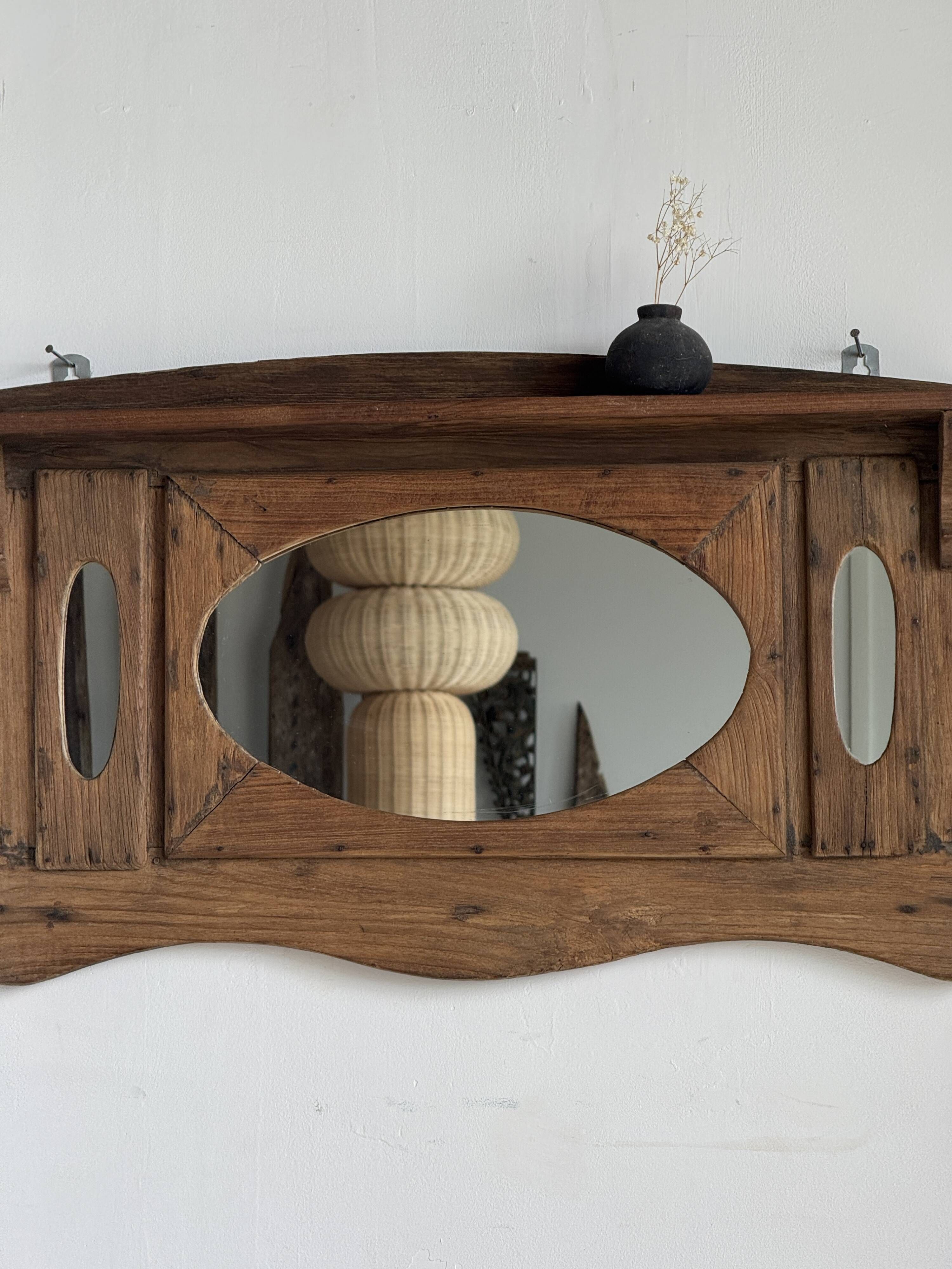 Small wall mirror in organic old Indonesian teak 75x45.