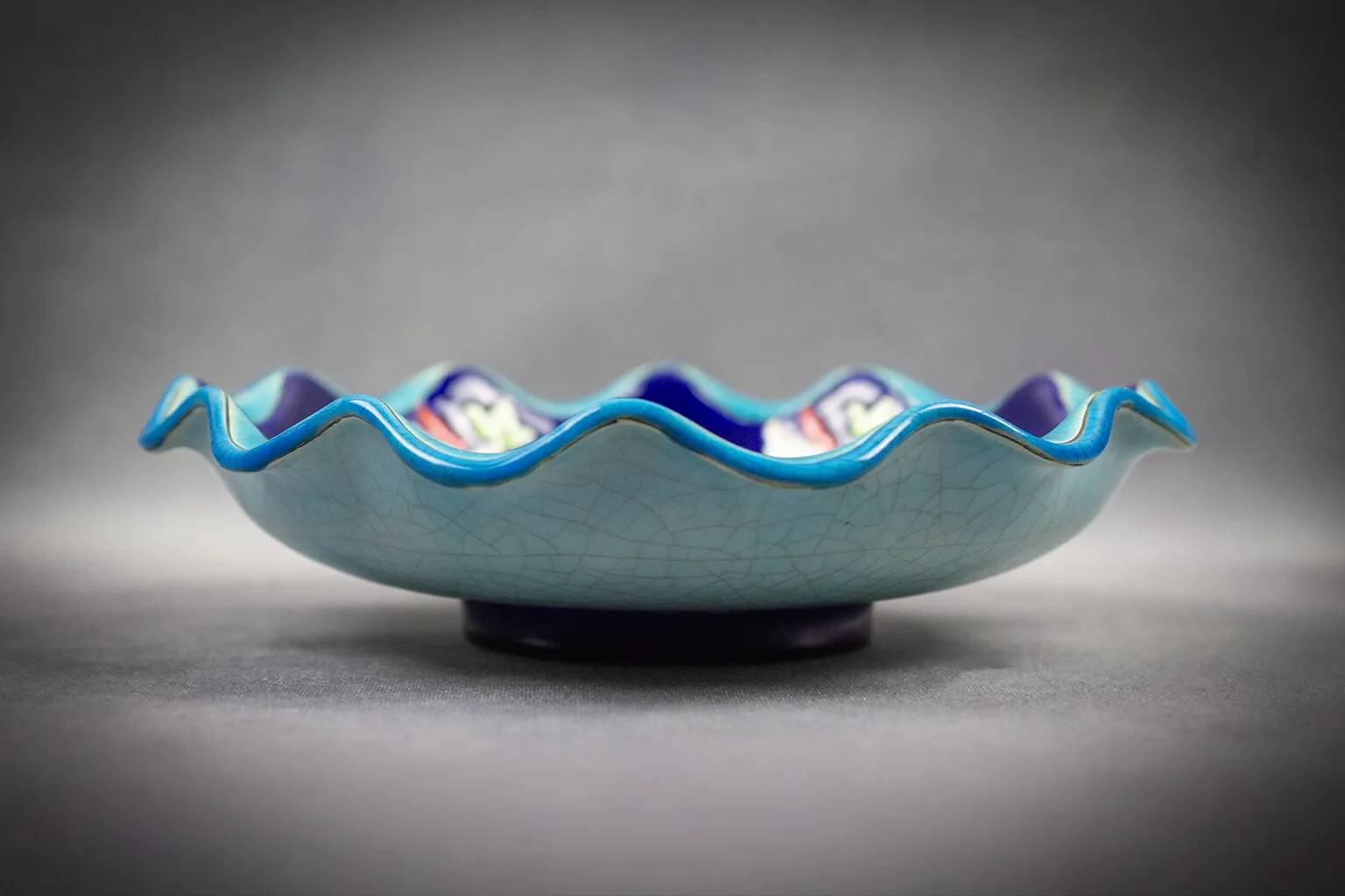 Longwy coupe model Roxane – Floral enamels on a crackled turquoise background