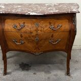 Curved and inlaid Louis XV style chest of drawers