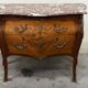 Commode galbée et marquetée style Louis XV