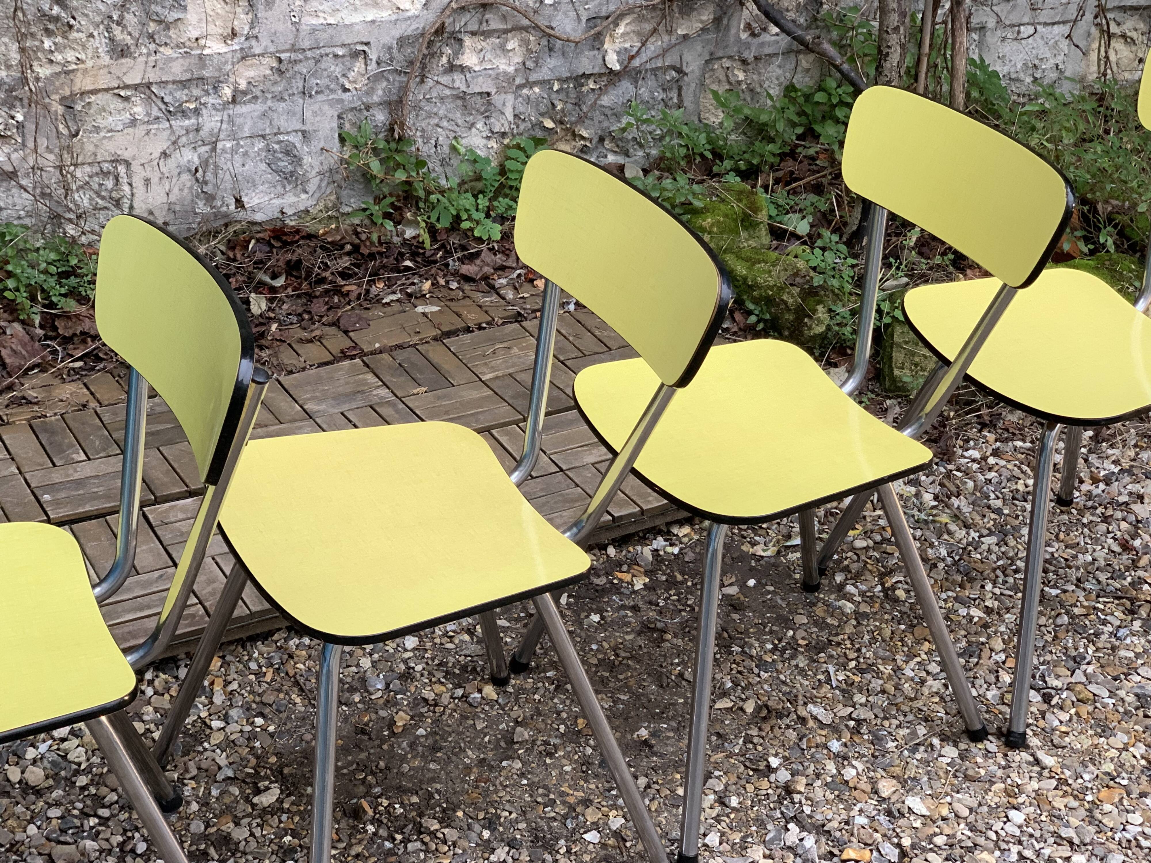 Yellow Formica chairs with compass legs, 1950s