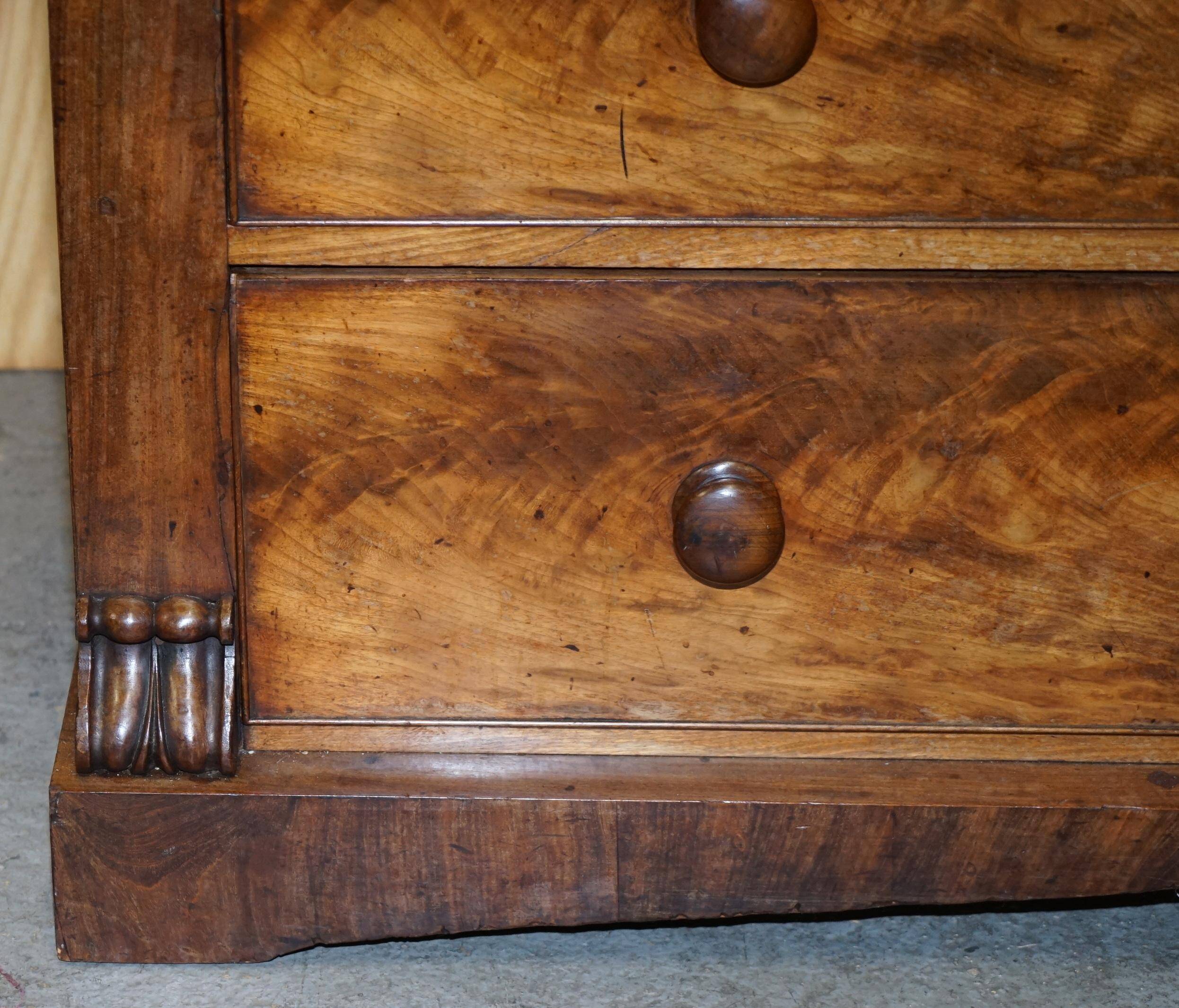Victorian flamed hardwood commode from the 19th century with a hidden drawer.