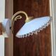 Pair of wall sconces in brass and wavy opaline glass