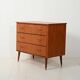 Scandinavian teak and mahogany chest with brass accents
