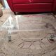 Design coffee table from Habitat in transparent plexiglass, mounted on wheels.