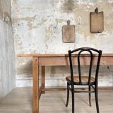 Solid wood workshop table with straight legs.