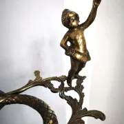 Italian brass umbrella stand, Art Nouveau style, with putti.