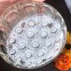 Vase pique-fleurs boule en verre épais à 19 trous France vintage