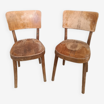 Pair of bistro chairs signed Baumann