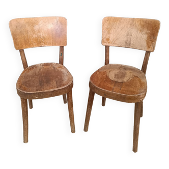 Pair of bistro chairs signed Baumann