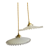 Duo of serrated opaline suspensions