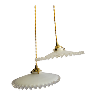 Duo of serrated opaline suspensions