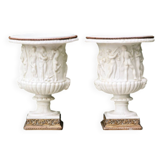 Pair of Medicis Borghese vases in porcelain biscuit and brass.