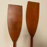 Pair of old oars in mahogany