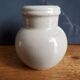 Small beige ball vase in glazed sandstone