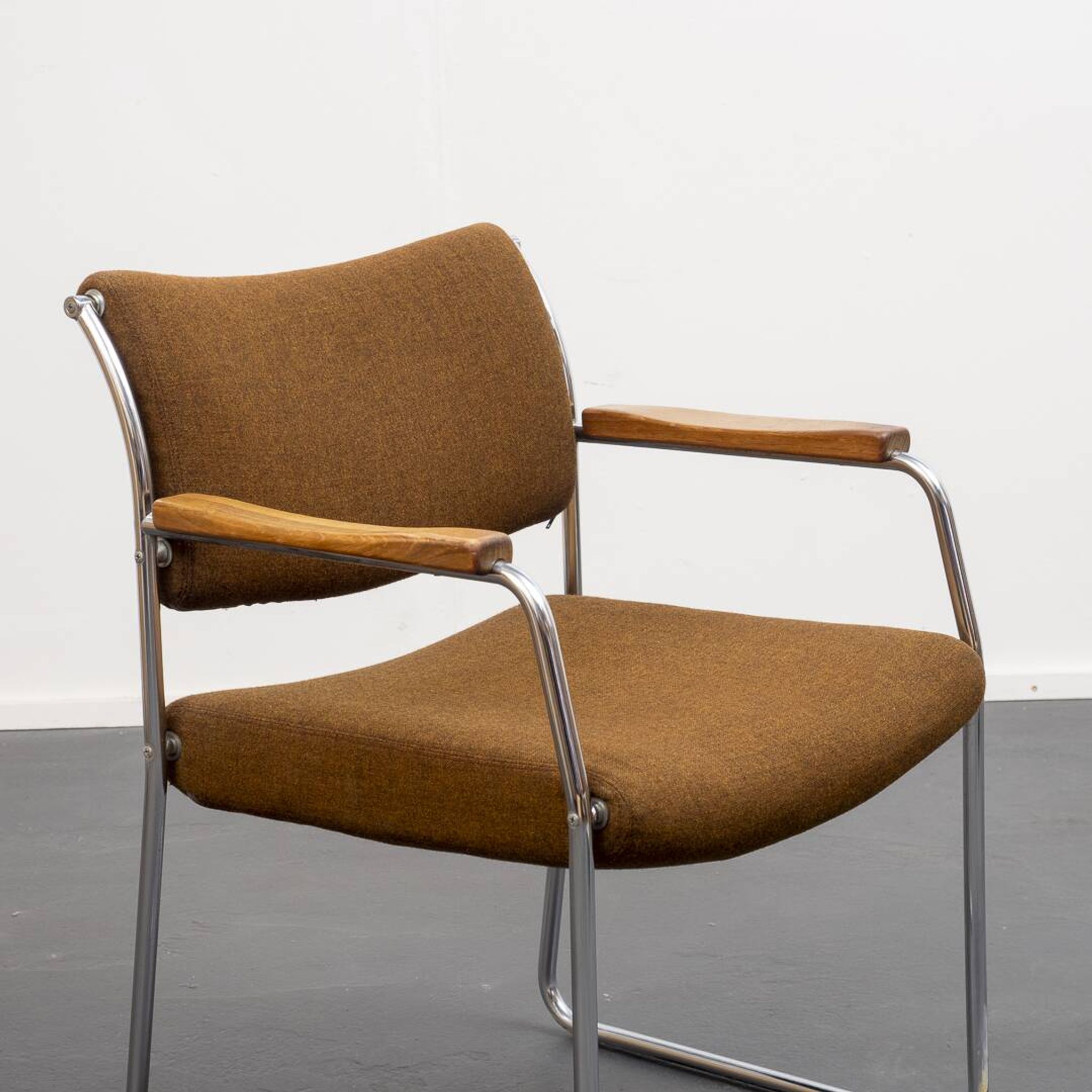 Armchair, 1960s, chrome metal frame, teak armrests.