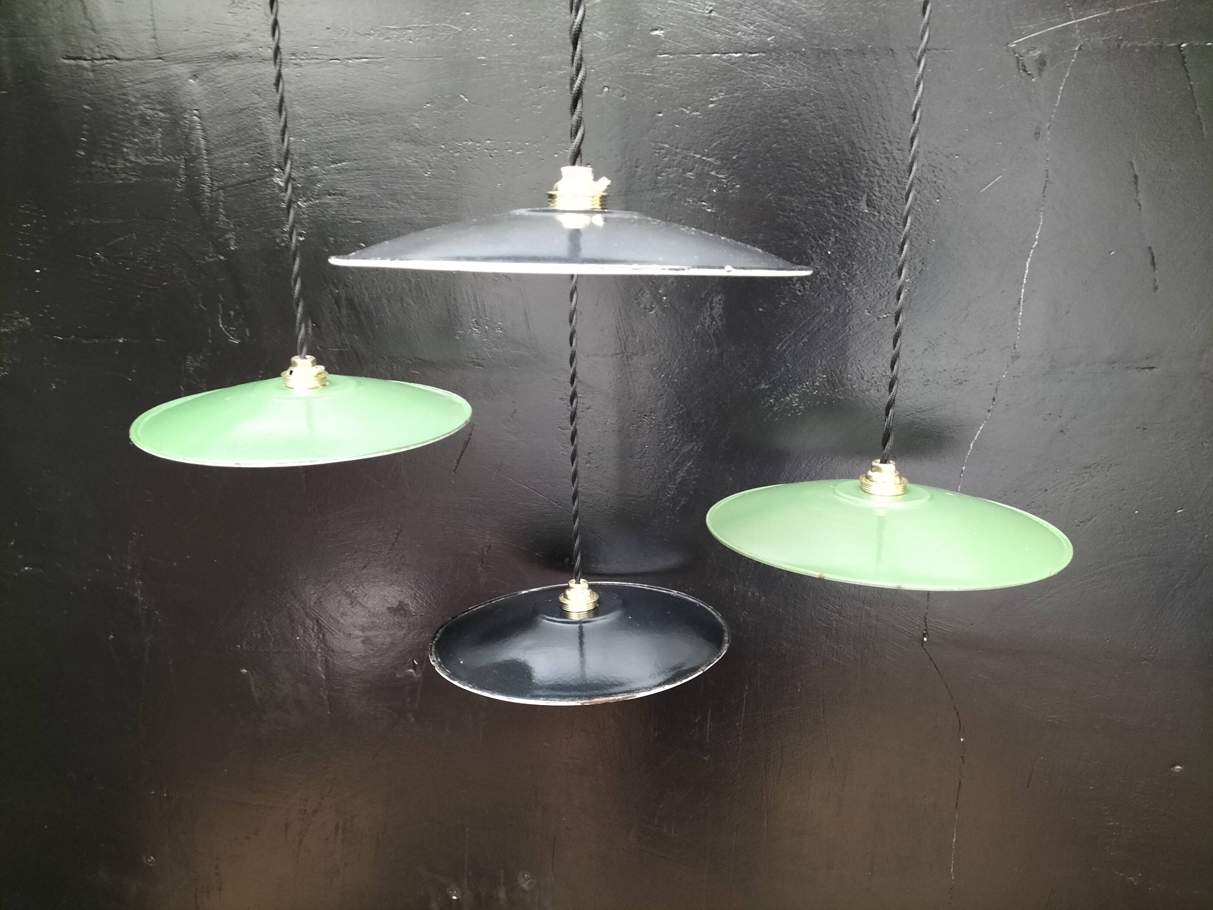 4 enameled sheet metal pendants