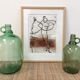 Pair of old demijohn bottles