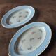 Set of 2 butter dishes, S A, opaque porcelain, Normandy