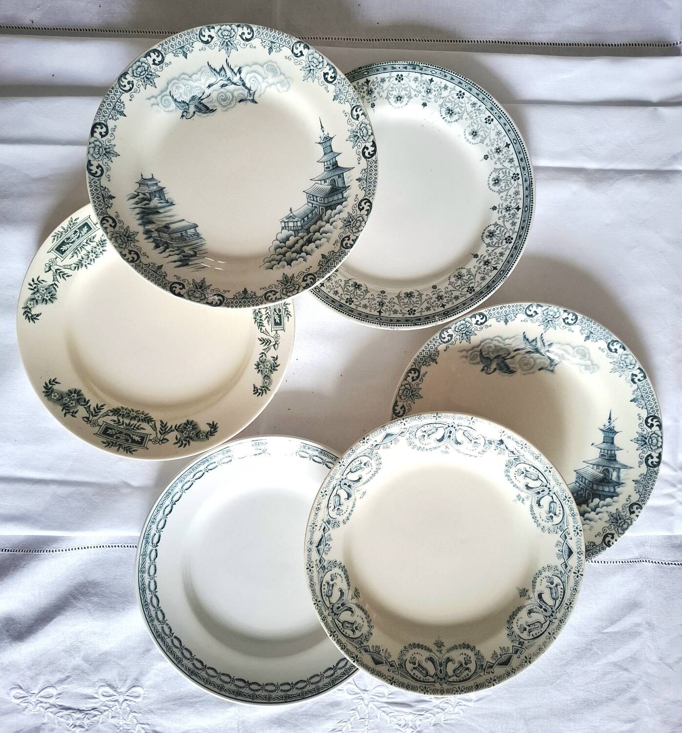 Mismatched antique ironstone dinner plates