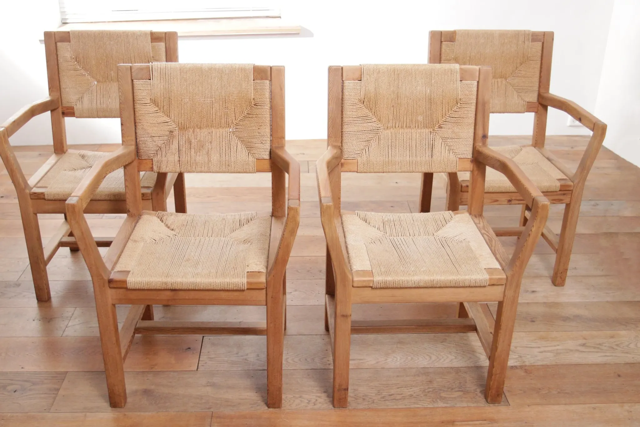 Set of four mid-century modern Danish dining chairs papercord solid pine