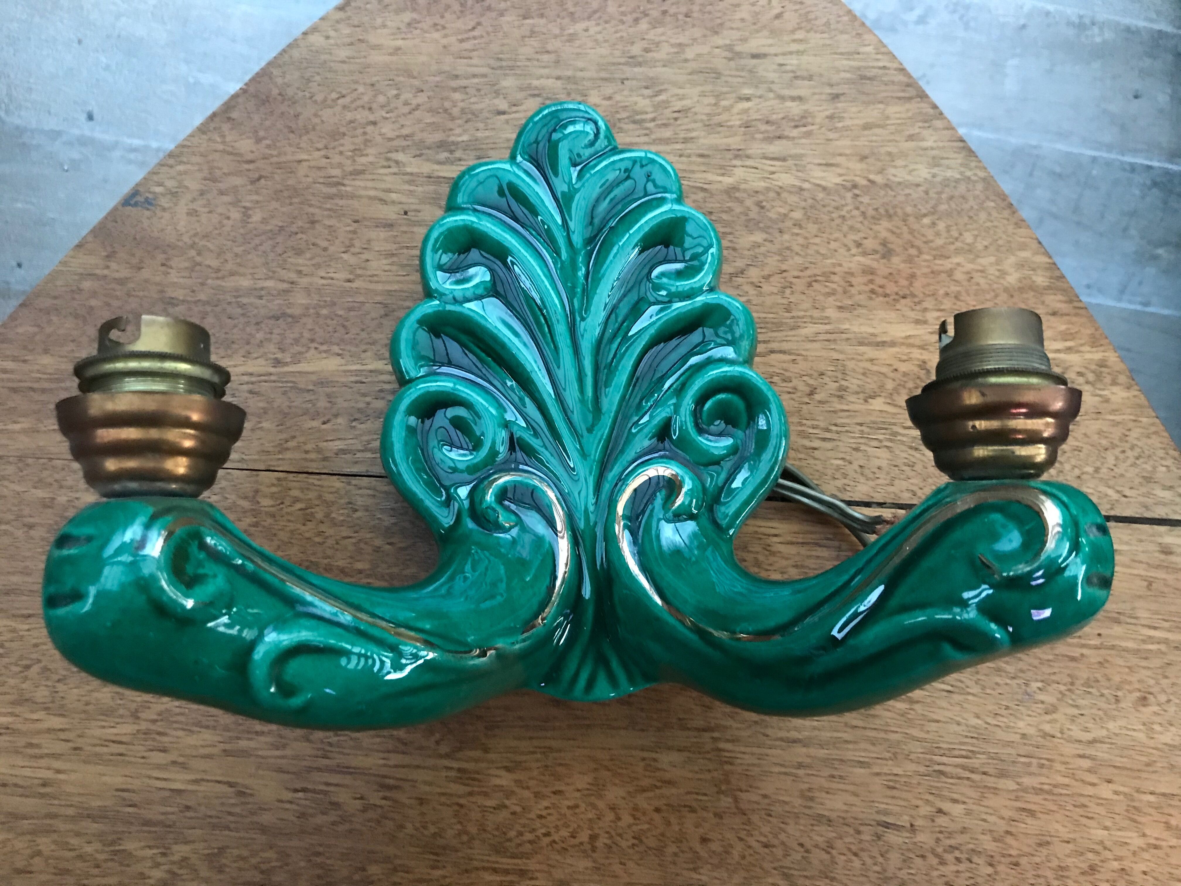 Former pair of art deco green ceramic wall sconces