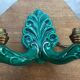 Former pair of art deco green ceramic wall sconces