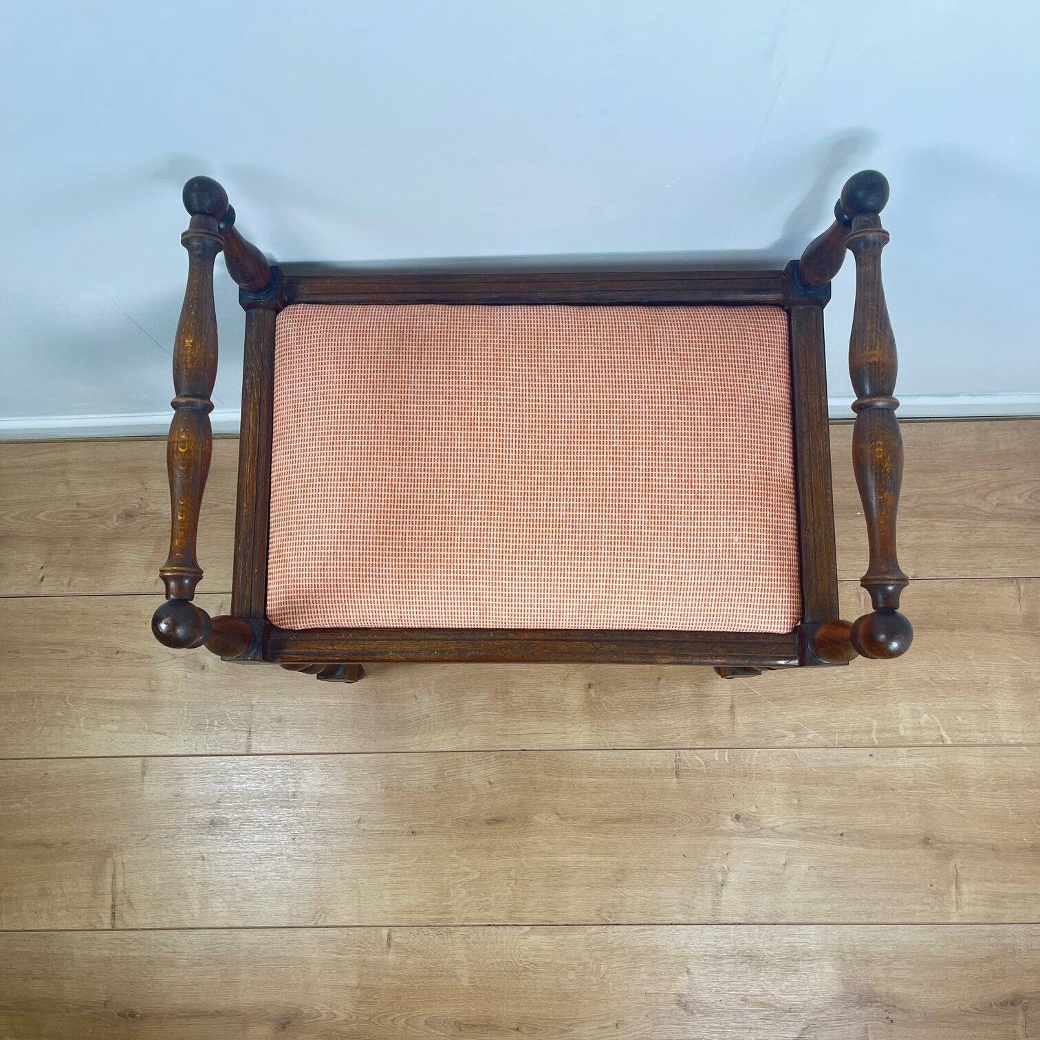 Small bench / stool in traditional English style, with side armrests.