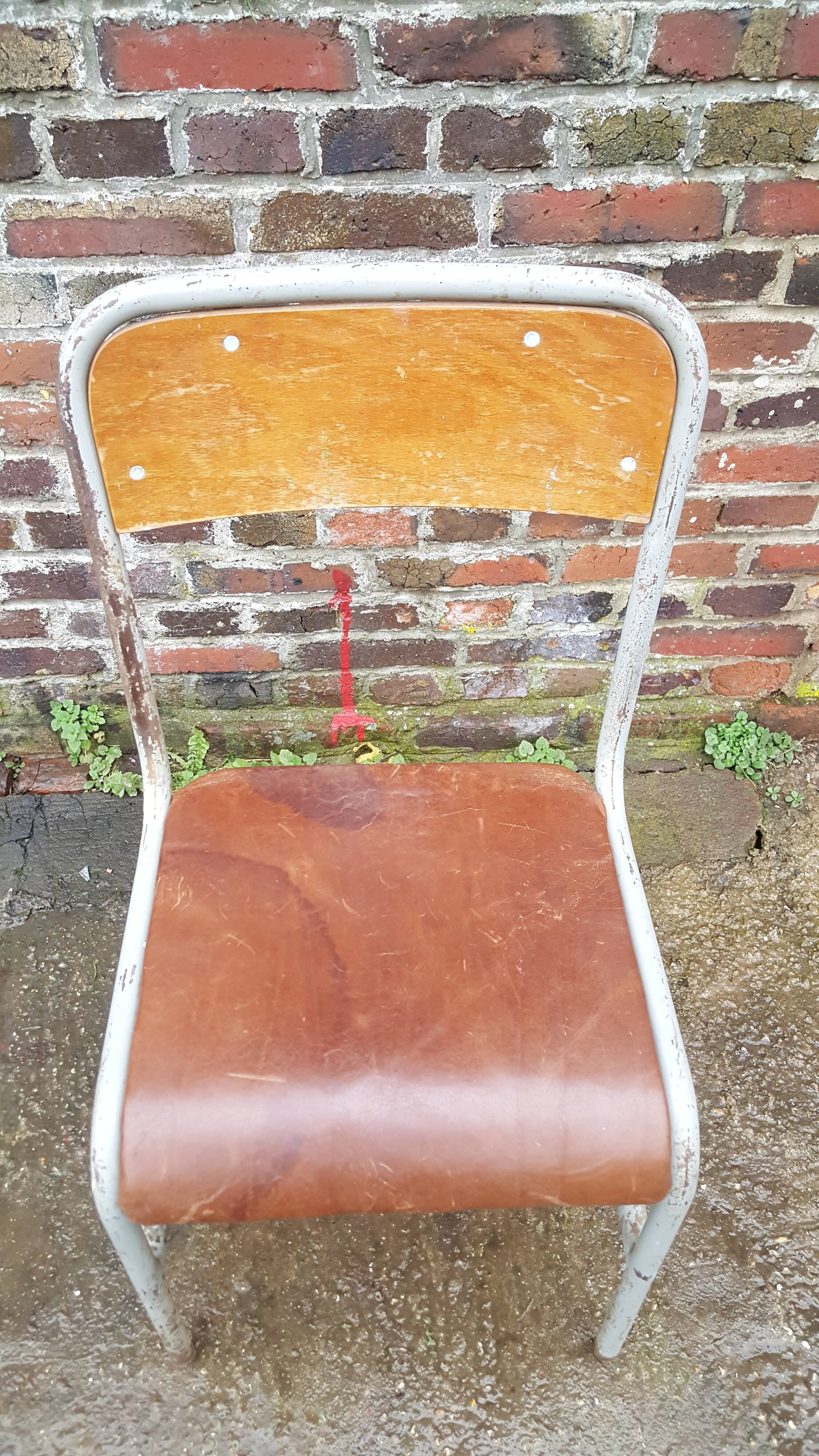 Vintage chair dated 1955 leather seat