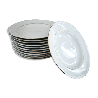 12 deep plates in porcelain with double gold trim.