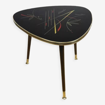 Tripod coffee table black and red graphic patterns