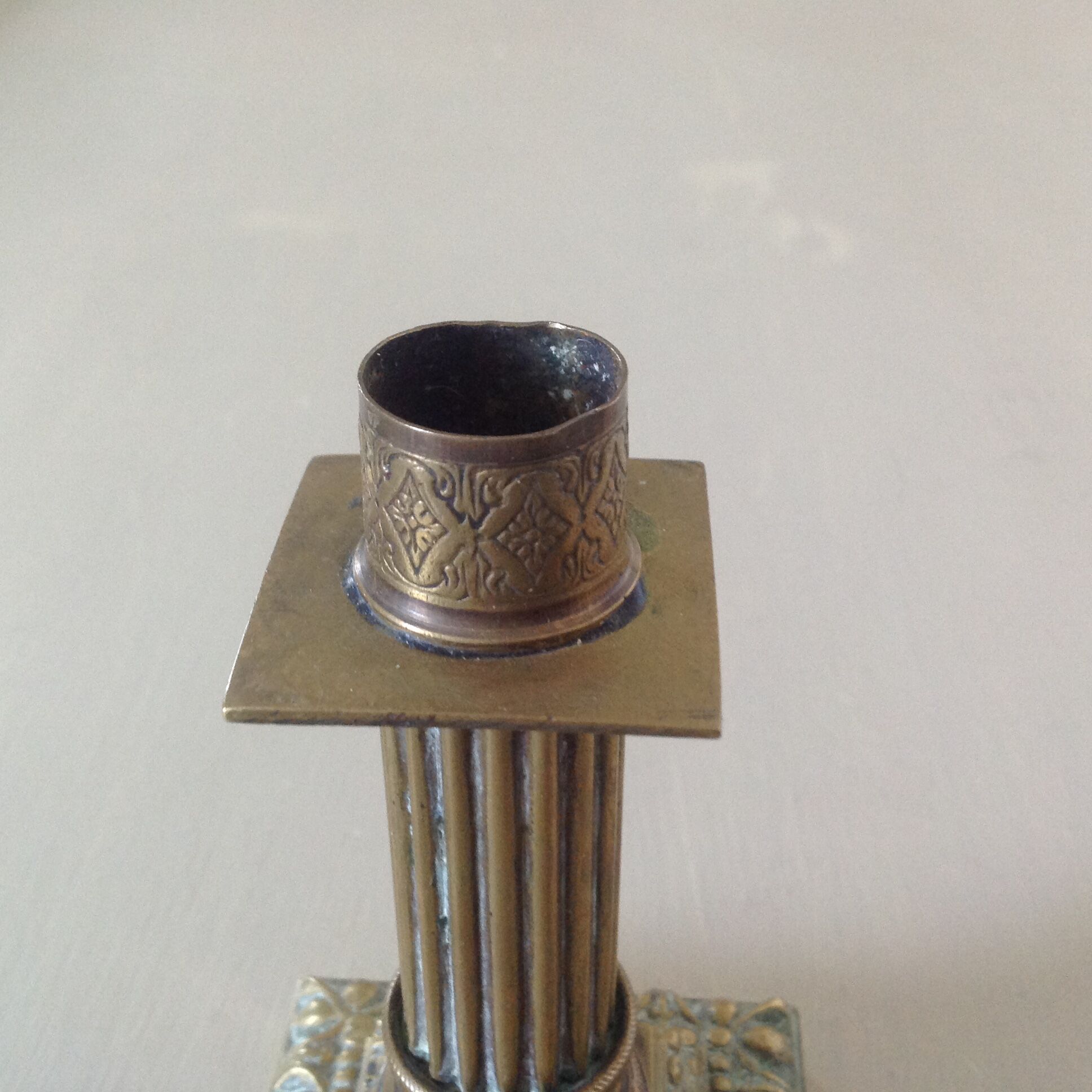 Duo of bronze candlesticks