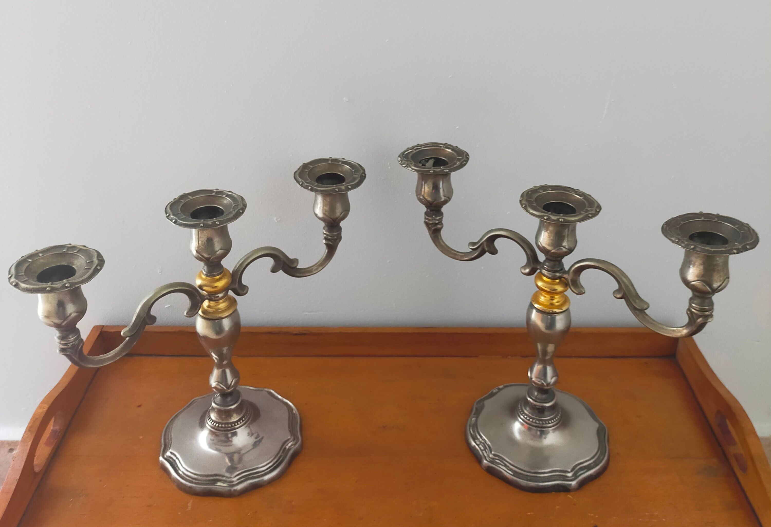 Pair of silver metal candlesticks