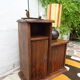 Asymmetrical brutalist furniture in solid elm