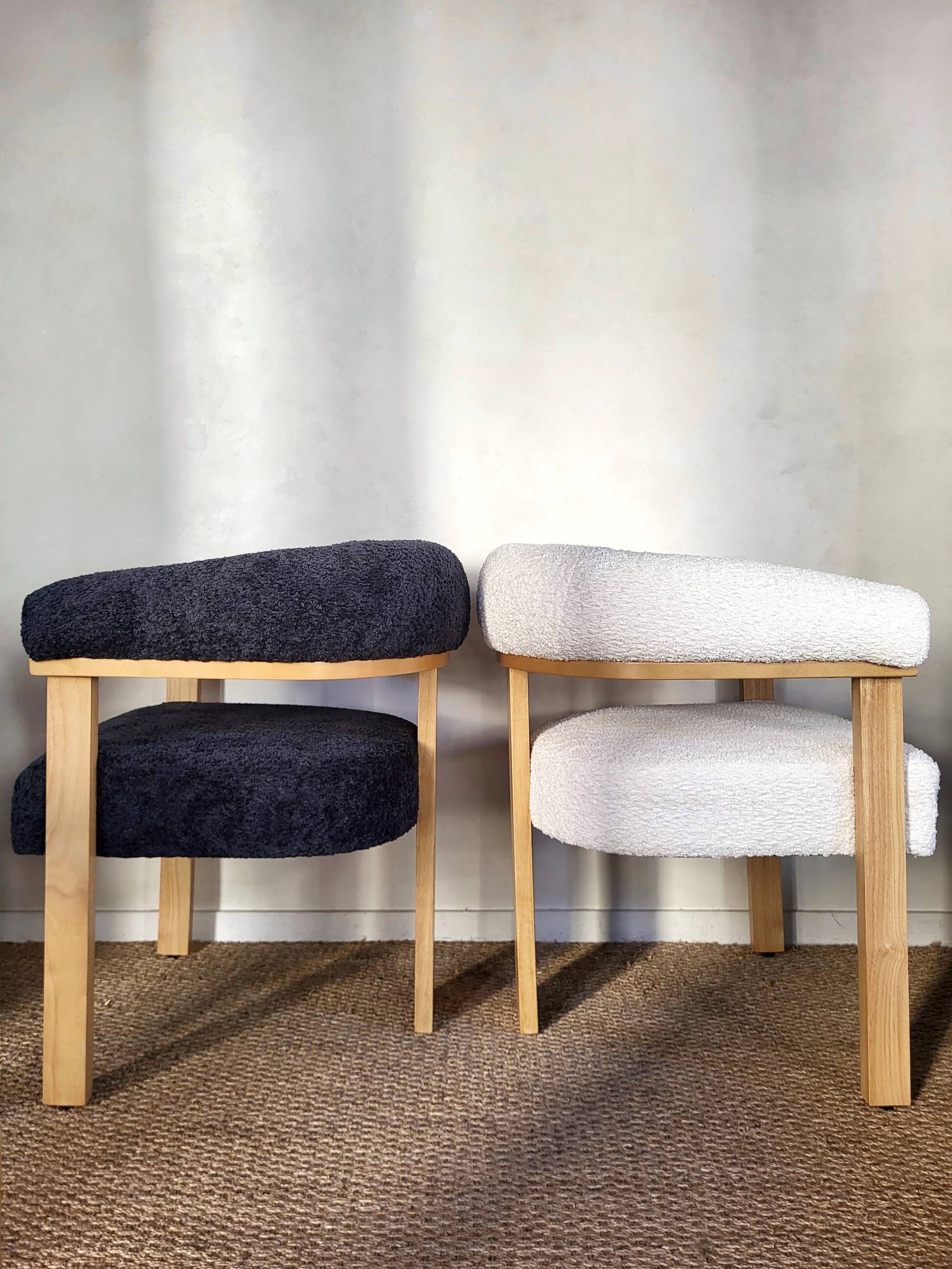 Contemporary armchair in wood and bouclé fabric