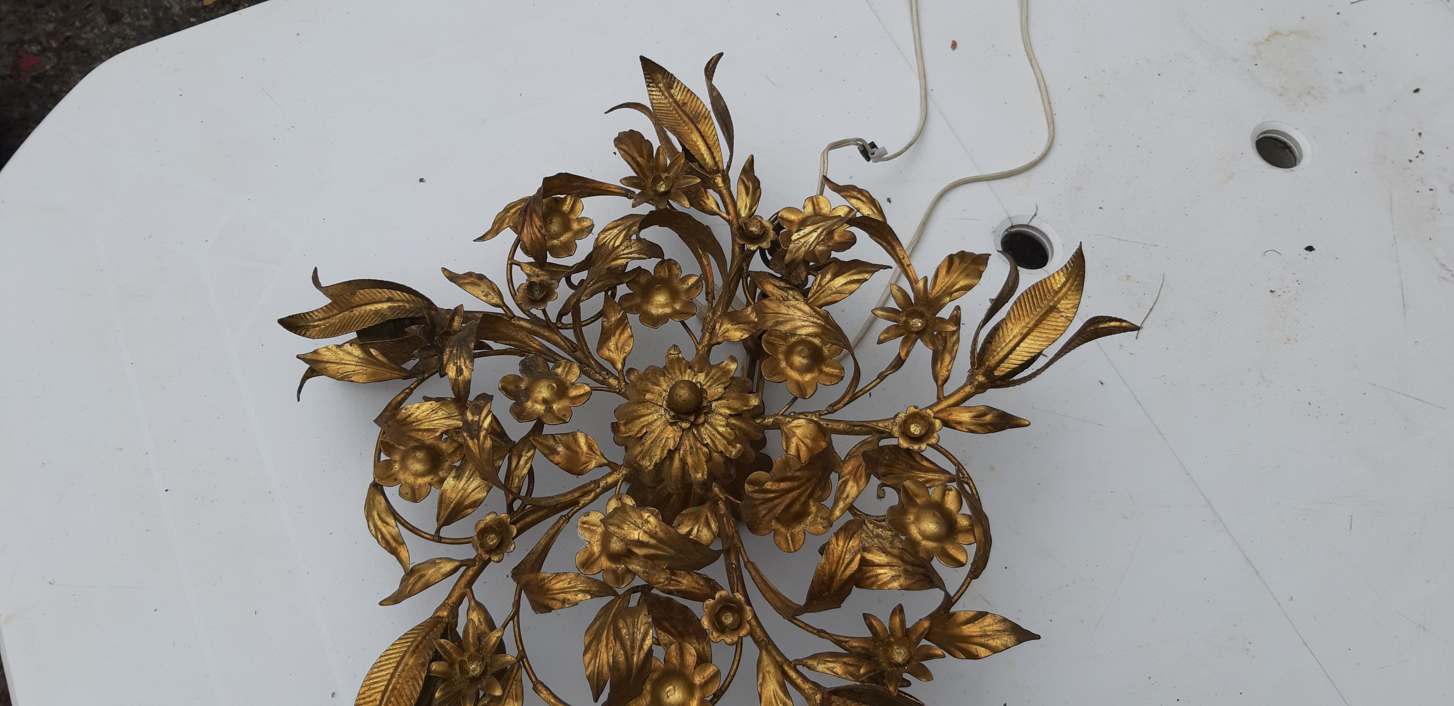 Vintage chandelier in gilded metal