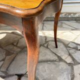 Solid wood table with curved legs