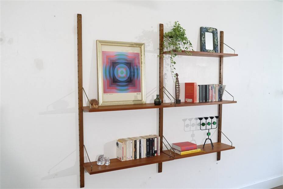 Danish wall shelving system in teak from the 1960s.