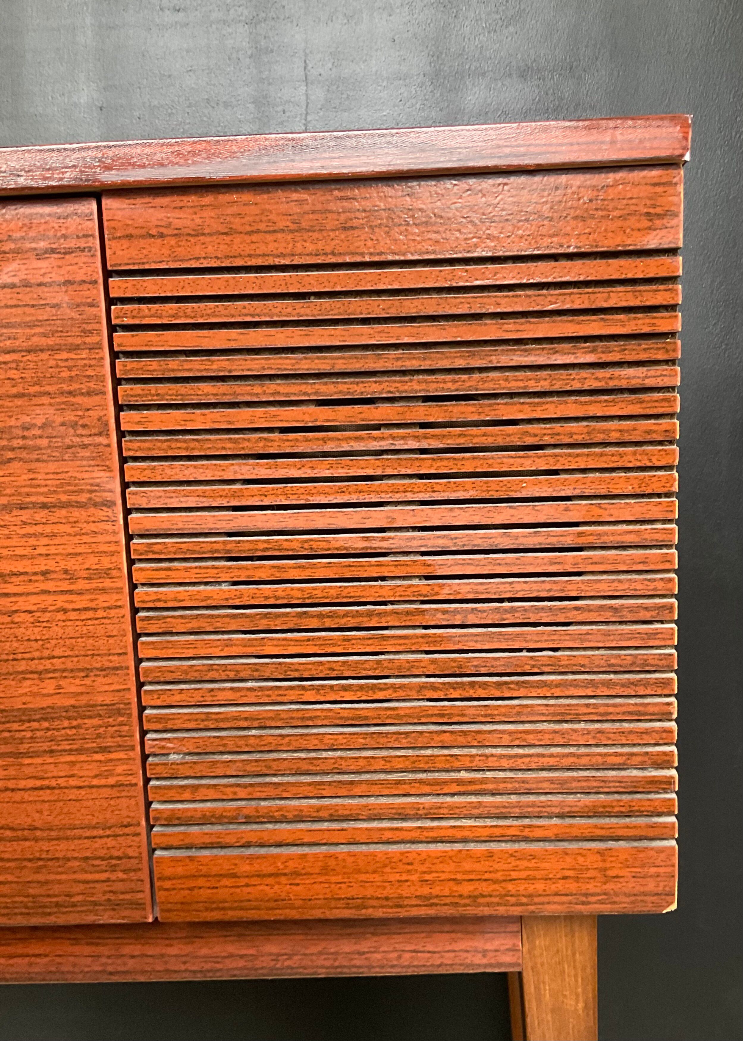 Vintage TV sideboard with radio and turntable.