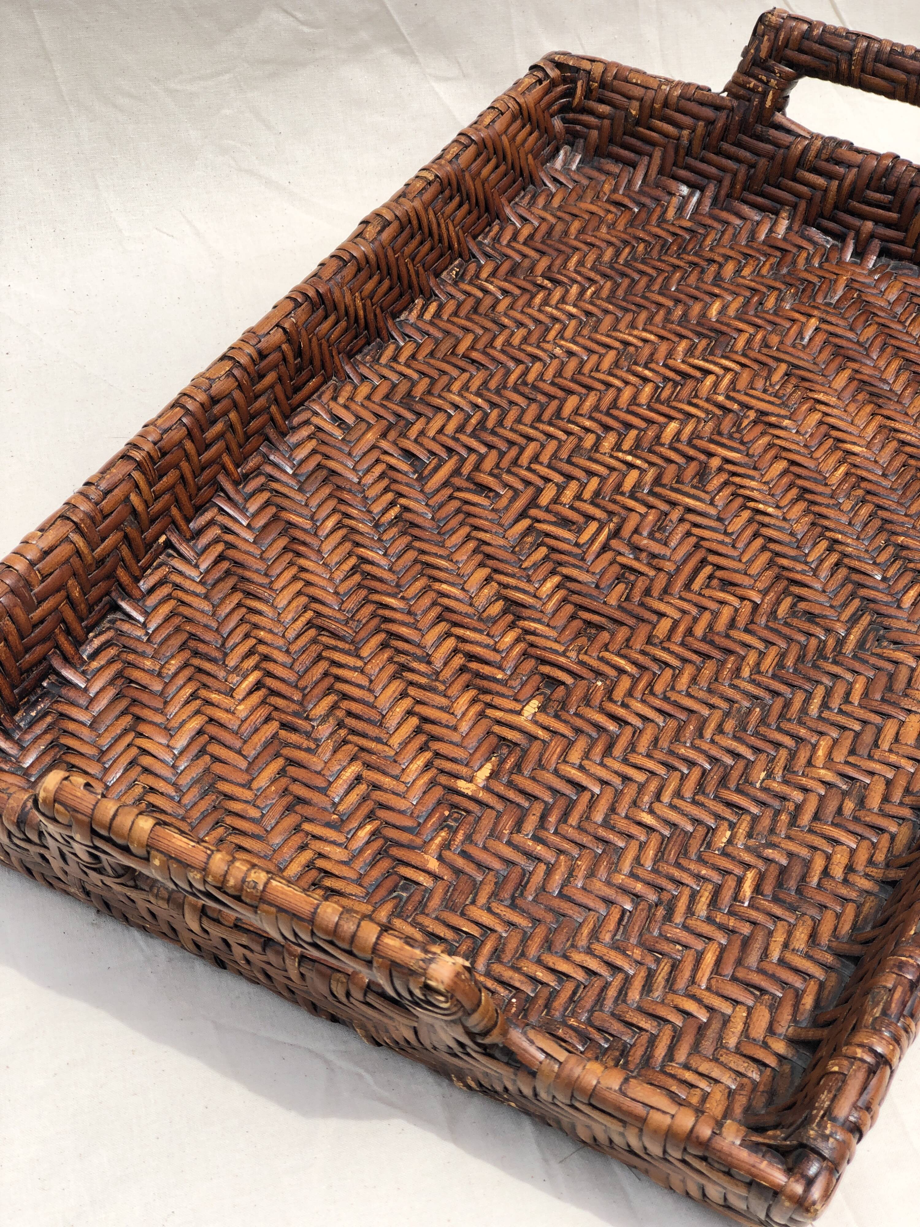 Pair of dark rattan trays